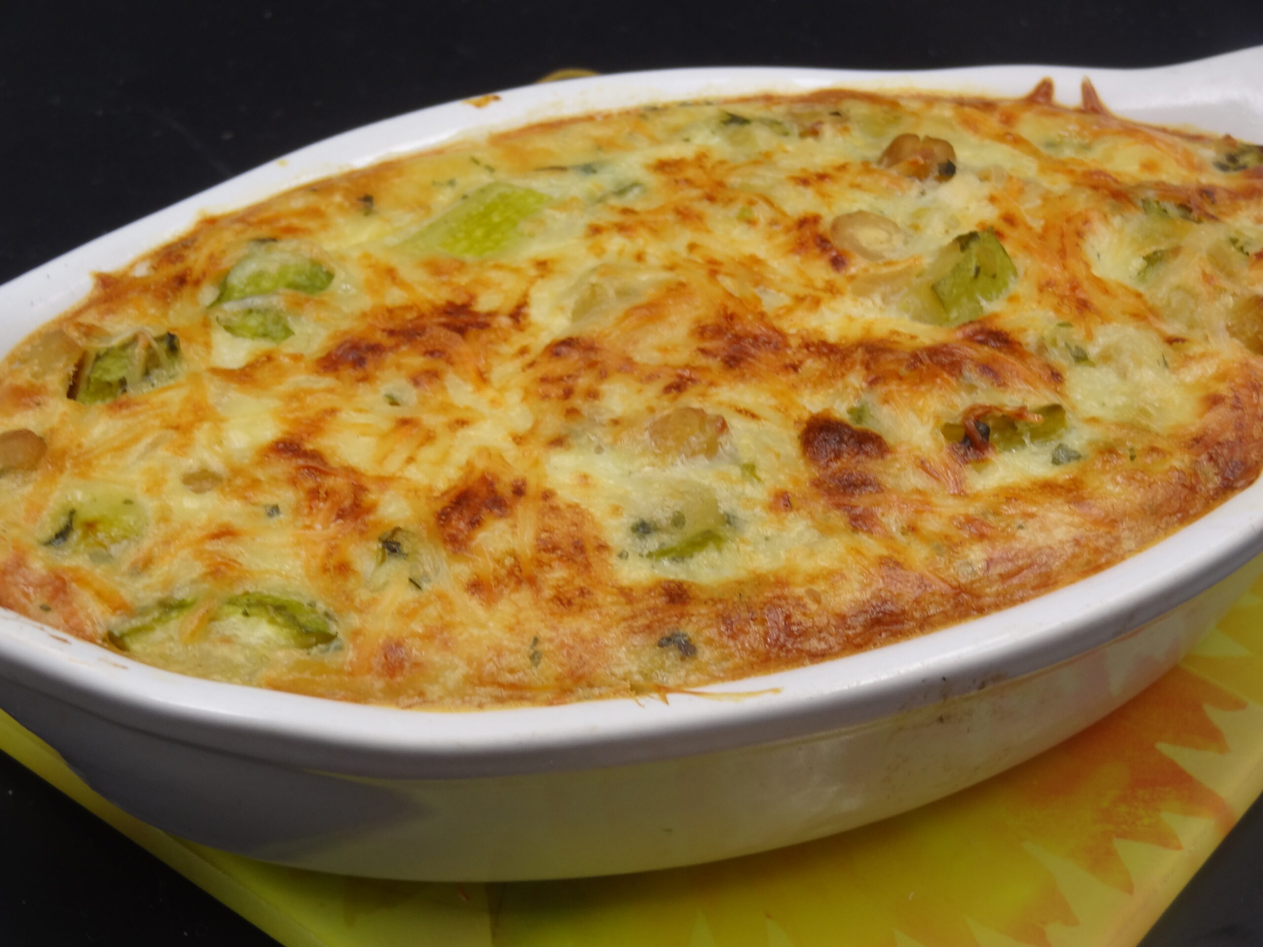 You are currently viewing GRATIN DE POULET COURGETTES POIS CHICHES